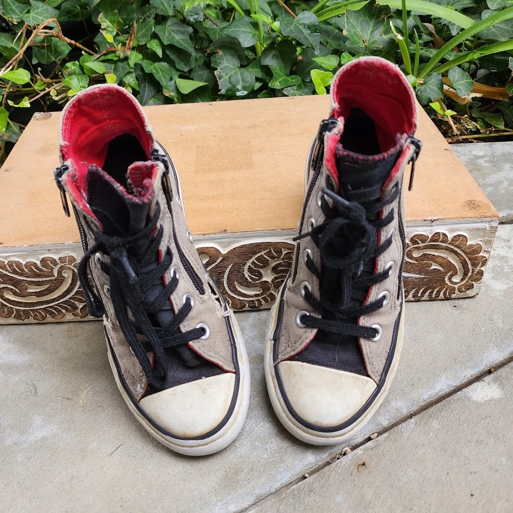 Distressed Converse High Top Sneakers